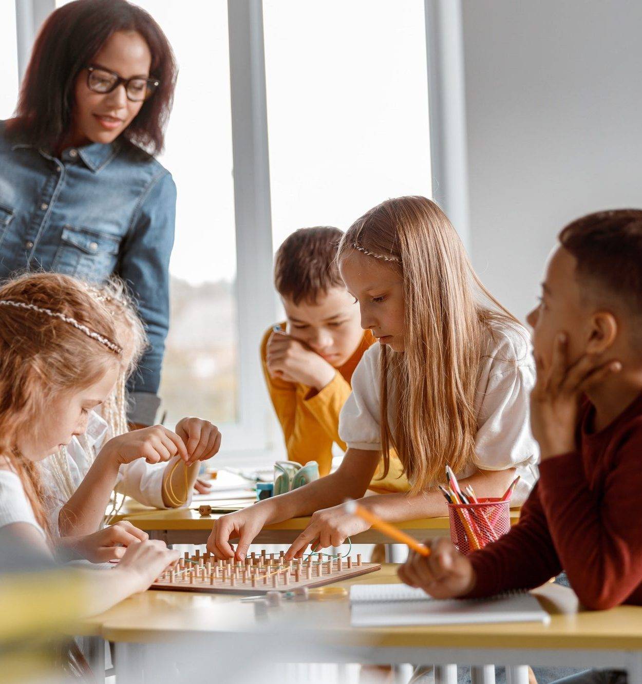 Kids training analytical and creative skills in classroom